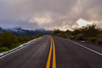 Snowy Road Through The Mountains