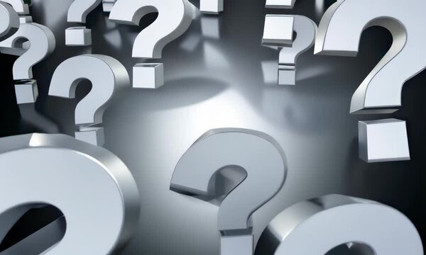 Silver question marks on dark background symbolize uncertainty and search.