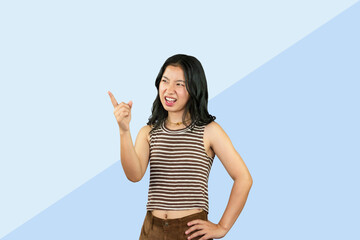 Excited Asian Student Girl gives expression hand fa gesture of sad, wow, happy, laughing in blue...