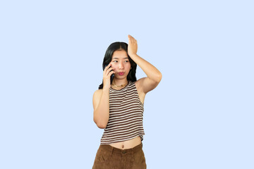 Excited Asian Student Girl gives expression hand fa gesture of sad, wow, happy, laughing in blue...