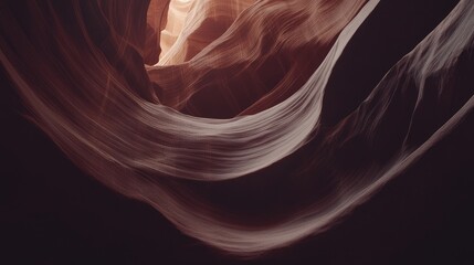 Atmospheric shot of the sandstone walls of Antelope Canyon, emphasizing their smooth textures and rich colors, no people.