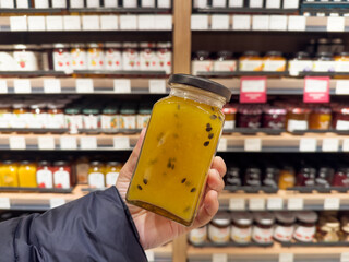 choosing products(confiture, jam ) at the grocery store 