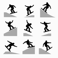 Obraz premium Silhouettes of snowboarders performing tricks on slopes, showcasing dynamic movements and stunts.