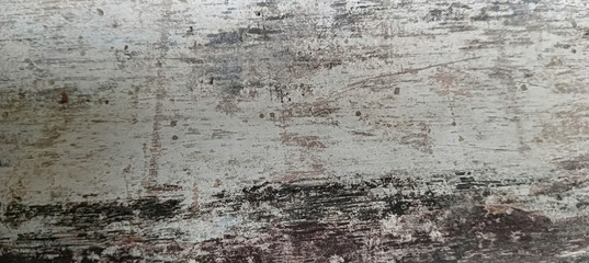 Rustic wood texture background featuring a rough, knotted table with visible cracks and vintage feel, showcasing the natural beauty of aged wood