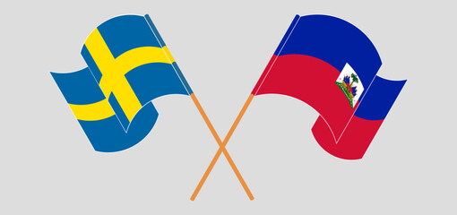 Crossed and waving flags of Sweden and Republic of Haiti. Vector illustration