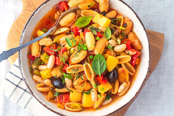 Minestrone soup with various vegetables and gnocchi Sardi pasta Malloreddus  , the first   Italian...