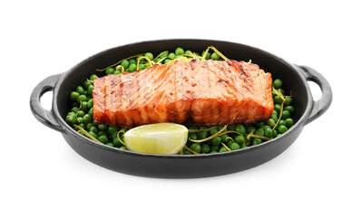 Delicious grilled salmon fillet with lime and green peas in baking dish isolated on white