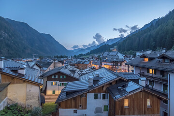 mountain roofs at twilight, Campitello di Fassa, Italy
