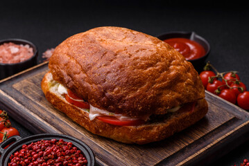Ciabata with jamon or prosciutto, tomatoes, cheese and lettuce