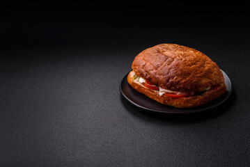 Ciabata with jamon or prosciutto, tomatoes, cheese and lettuce