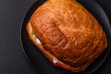 Ciabata with jamon or prosciutto, tomatoes, cheese and lettuce