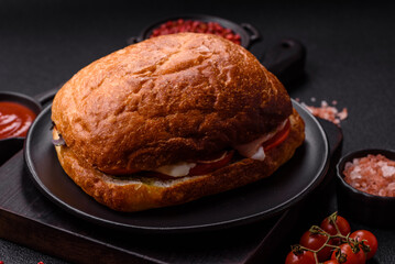 Ciabata with jamon or prosciutto, tomatoes, cheese and lettuce