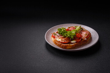 Ciabata with jamon or prosciutto, tomatoes, cheese and lettuce