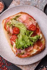 Ciabata with jamon or prosciutto, tomatoes, cheese and lettuce