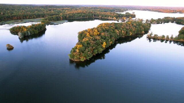 Aerial view of Kent lake in the Kensington metro park Michigan during autumn time.