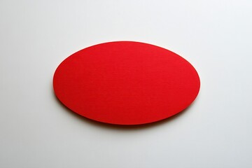 Oval-shaped red adhesive tags displayed on a simple white background