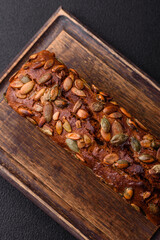 Brown bread with seeds, grains, salt and spices