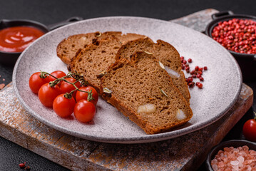 Brown bread with seeds, grains, salt and spices