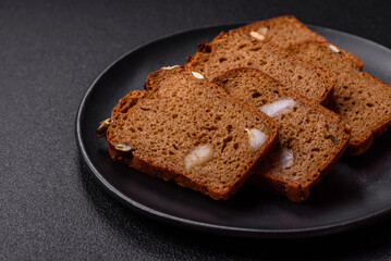 Brown bread with seeds, grains, salt and spices