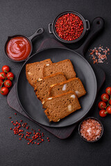 Brown bread with seeds, grains, salt and spices