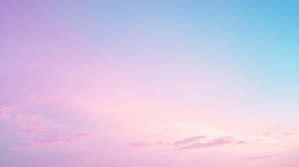 Fototapeta premium A serene sky painted in soft pastel hues of pink and blue, evoking a tranquil and dreamy atmosphere.