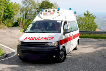 ambulance van speeding down the road during an emergency © ChiccoDodiFC