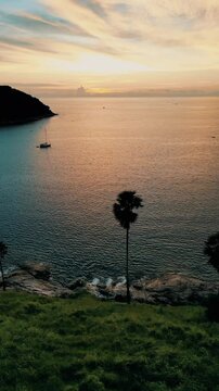 Vertical Video - Aerial View of Twilight Sea from Island