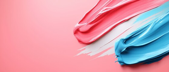  A red, white, and blue paint smear on a pink and white background with a distinct red and blue smudge