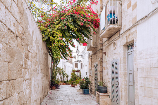 Fototapeta Polignano a Mare street view in the Historic Center, Italy