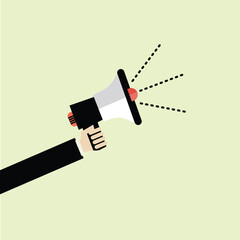 hand holding a Loud speaker. advertising concept.