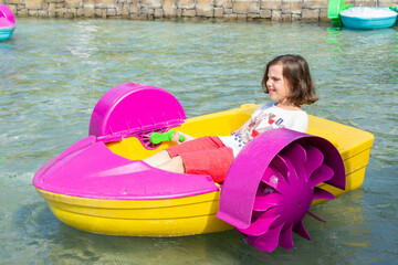 children playing boat in the garden area of Roro Jonggrang Temple