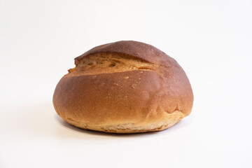 Fresh crispy bread on a white background. Front view