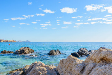 Different stages of the fantastic ocean waves. Rocky and sandy beach. Santa Maria Beach, Cabo San Lucas, Mexico.