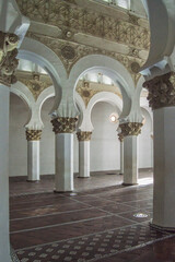 Obraz premium Interior with Mudejar arches in the synagogue of Santa Maria la Blanca in Toledo. Spain