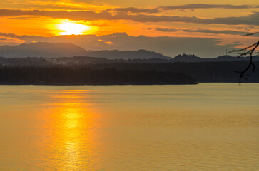 ocean sunset over mountains at summer day in Vancouver, Canada