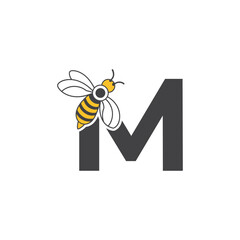 Initial letter M bee logo design. Honey bee with letter M on wings logo or icon vector bee design illustration concept .
