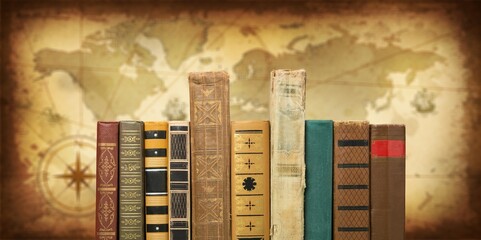 Old geographical map and set of books