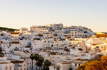 Sunset Serenity: The Enchanting Skyline of Vejer de la Frontera Illuminated in Warm Hues, Inviting...