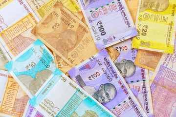 Cash with Indian rupees in various denominations of currency banknotes for business investments economic development
