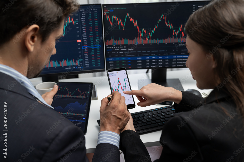 Poster focusing on phone with discussing dynamic stock market in two business traders online website compar