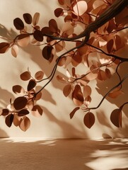 Close-up of decorative leaves casting shadows on a beige wall.