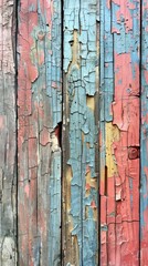 Weathered wooden wall with peeling paint revealing colorful texture and aged appearance