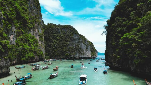 Exploring Phuket's Bays: Drone View of Boats on Clear Waters