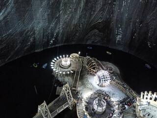 Exploring the surreal beauty of Salina Turda - underground adventure in a breathtaking salt mine with stunning lights and reflections