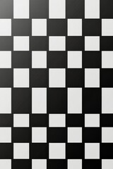 Black and white checkerboard floor design featuring alternating marble tiles in a modern space