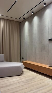Modern Living Room video with Minimalist Design and Ambient Lighting. 4K Ultra Quality. Camera rotation