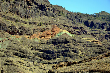 Los Azulejos de Veneguera. Rainbow colored rocks in the Mountains of Gran Canaria Island, Spain.