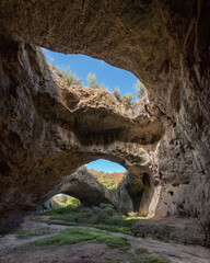 Majestic Cave Arches with Openings to the Sky in Devetashka Cave, Bulgaria