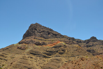 Los Azulejos de Veneguera. Rainbow colored rocks in the Mountains of Gran Canaria Island, Spain.