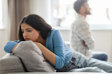 Problems, quarrel and divorce. Indian couple having domestic scandal, upset young wife and husband...